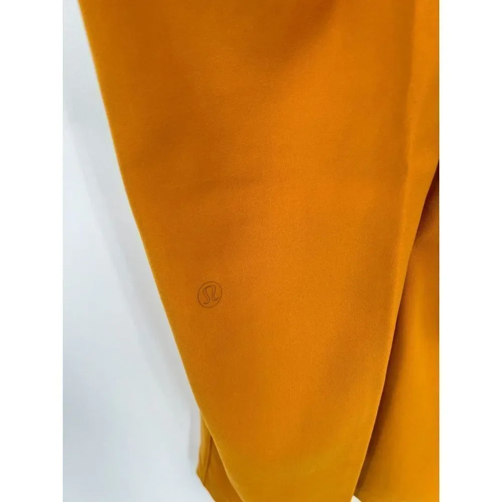 Lululemon On the Fly 7/8 Pant Woven Vintage Gold Mustard Yellow Women’s Size 4